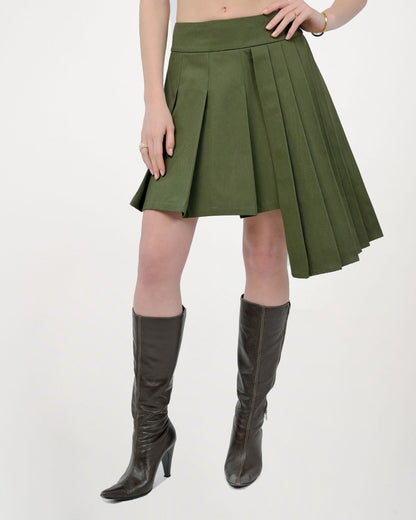 Model is wearing a size Small in Asha Pleated Layered Skirt by Aseye Studio in Military Olive Green