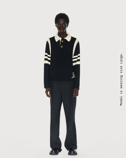 Model is wearing size Large in Kai Rugby Knit Sweater by Aseye Studio. 