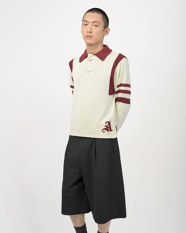Model is wearing size medium in the Kai Rugby Knit in Cream and Maroon