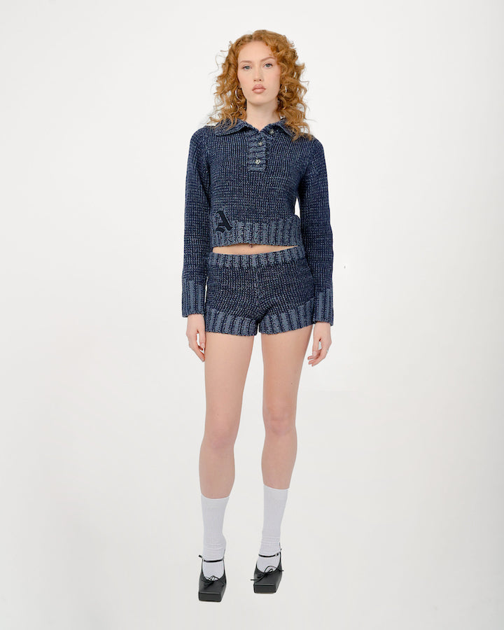 Model is wearing Zaya Knit Top by Aseye Studio