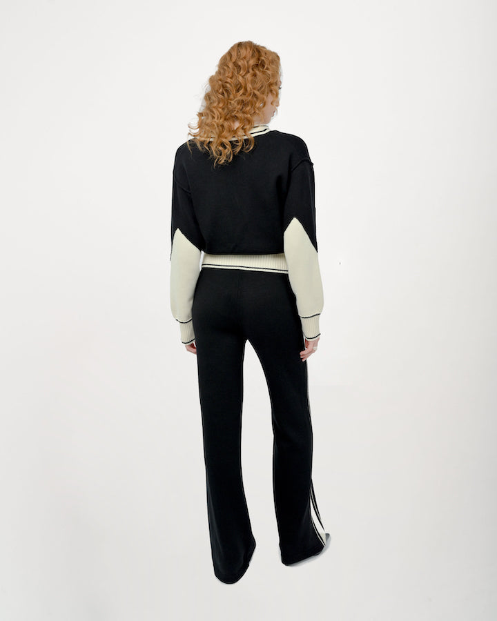 Back View of Byrd Classic Knit Cardigan in Black and Cream by Aseye Studio
