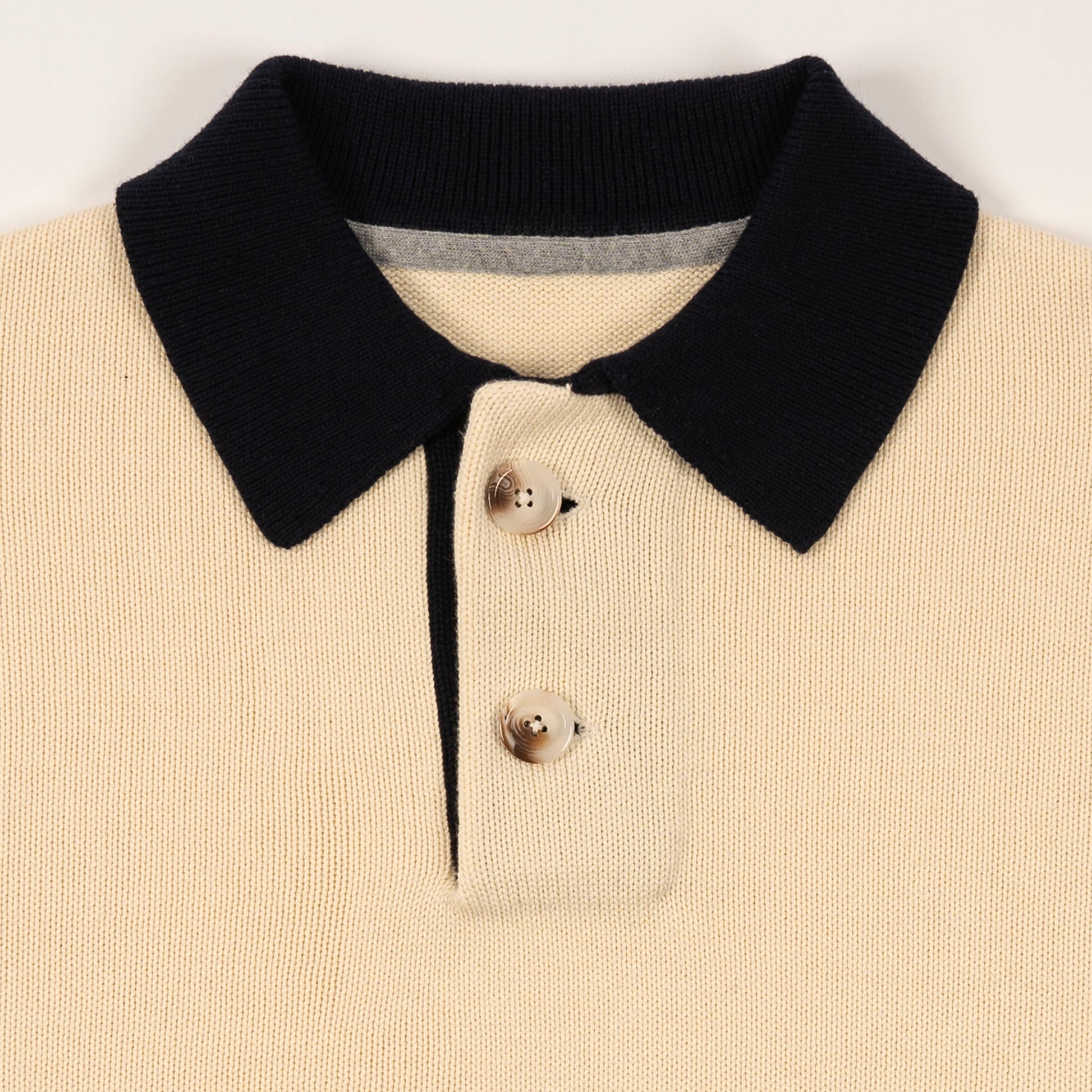 Detail View of Ribbed Collar and Buttonson Kai Rugby Knit Sweater by Aseye Studio