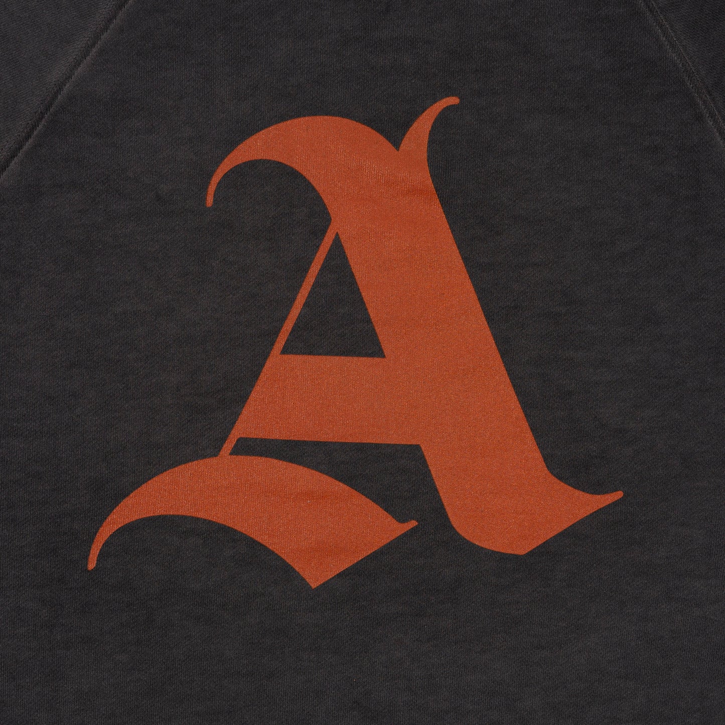 Detail View of Printed Signature 'A' Logo design on August Pullover Sweatshirt by Aseye Studio