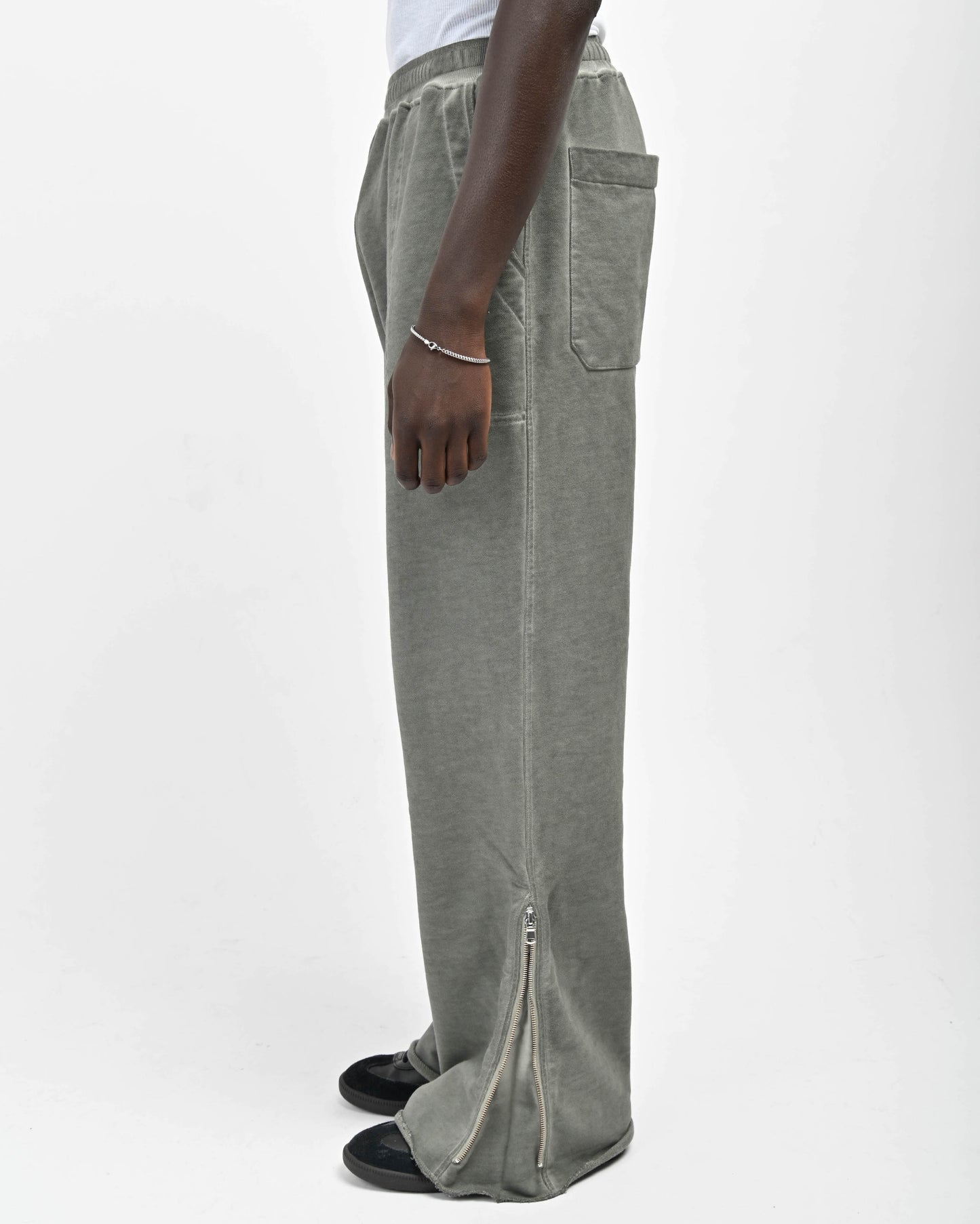Side View of Zipper on Allora Track Pants by Aseye Studio
