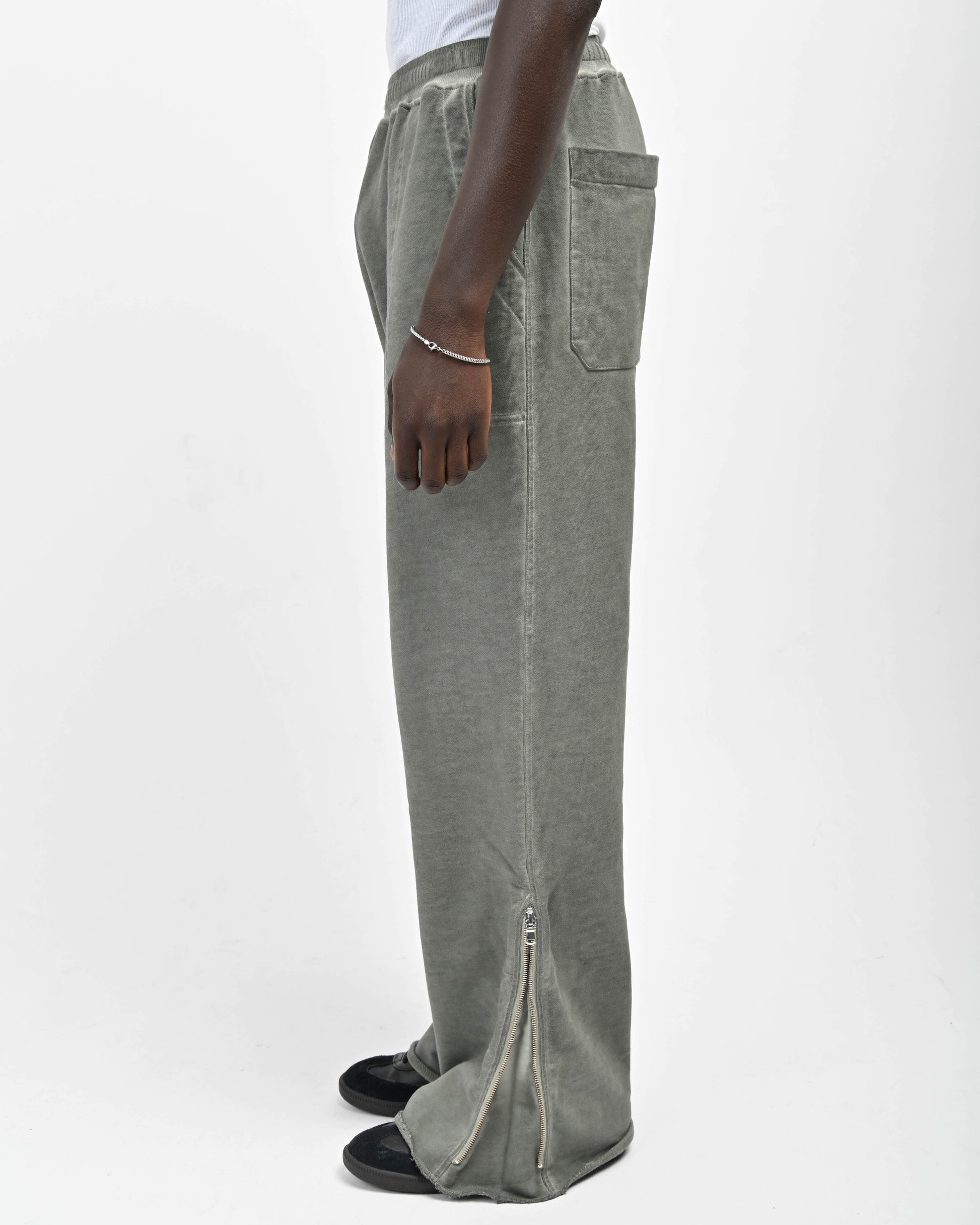 Side View of Zipper on Allora Track Pants by Aseye Studio