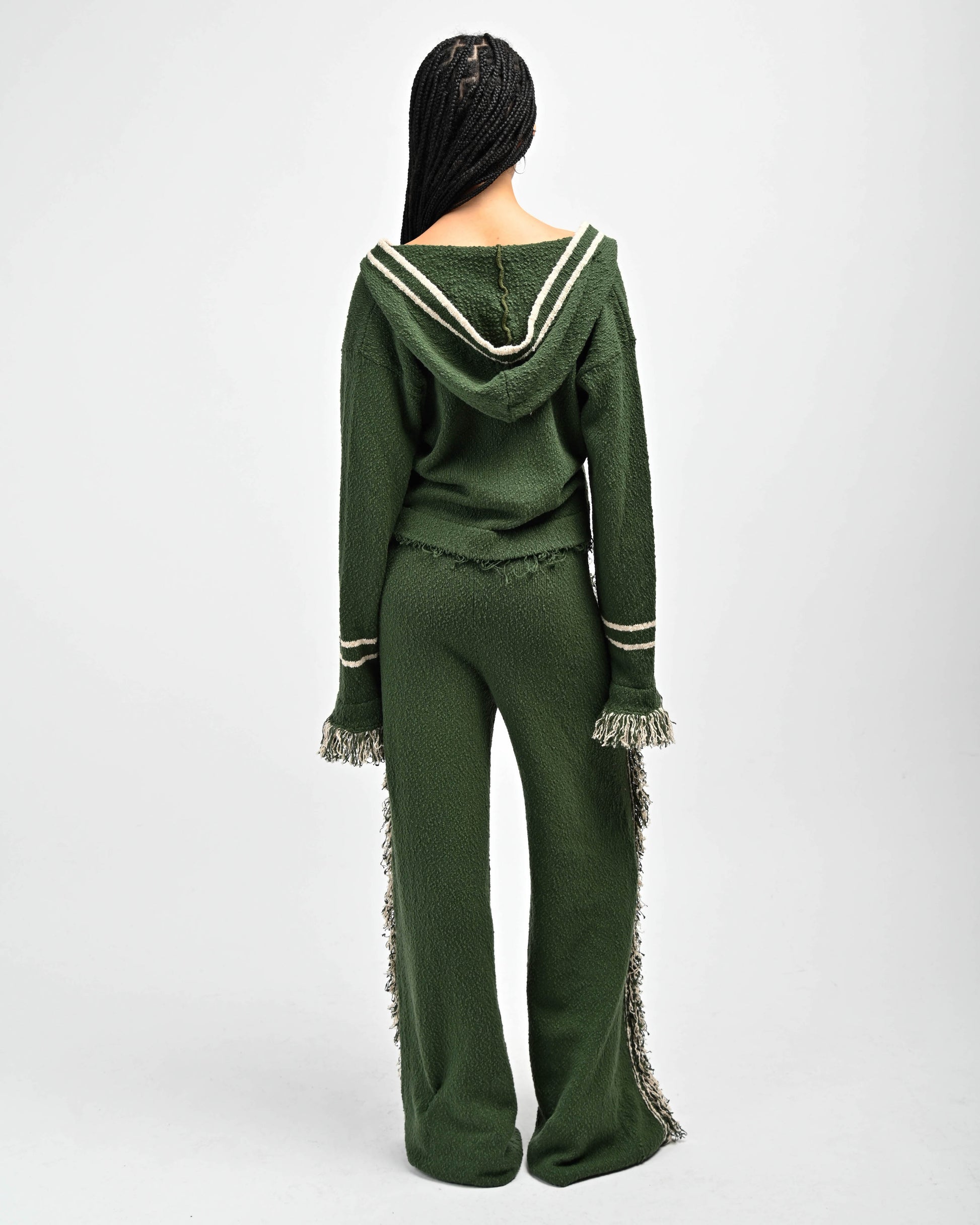 Back View of model wearing Andy Fringe Knit Hoodie and Andy Fringe Knit Pants in Miki Green by Aseye Studio