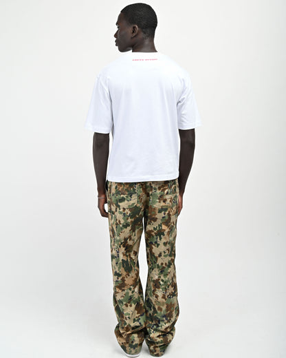 Back View of model wearing Plaid 'A' T-shirt by Aseye Studio 