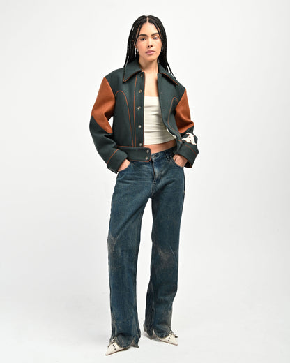 Model is wearing a size Small in Green Rue Varsity Jacket by Aseye Studio