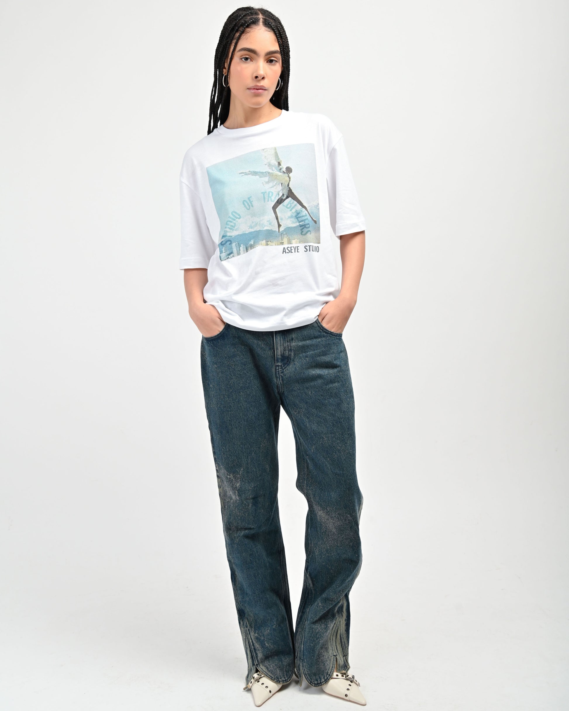 Model is wearing Studio of Trailblazers T-shirt in White by Aseye Studio featuring Donyale Luna Print