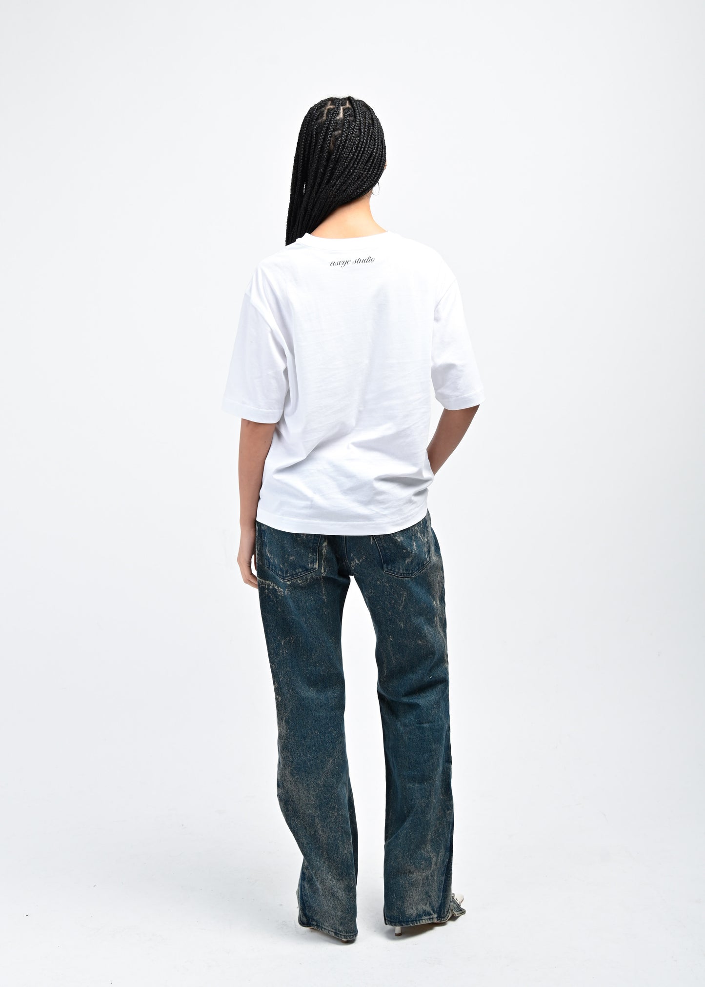 Back View of Model wearing Studio of Trailblazers T-shirt by Aseye Studio