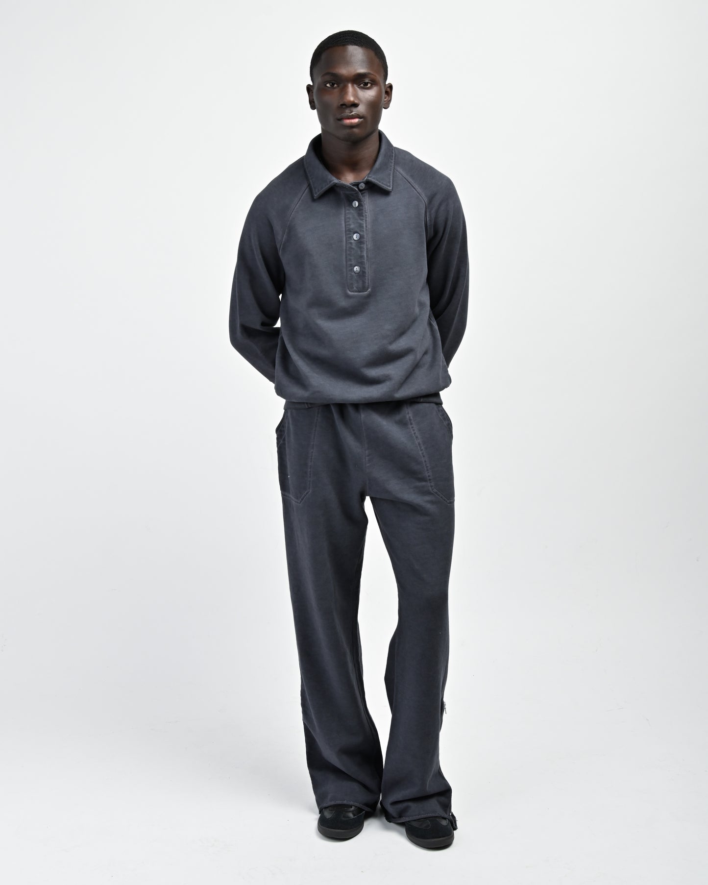 Model is wearing August Pullover Sweatshirt and Allora Track Pant by Aseye Studio