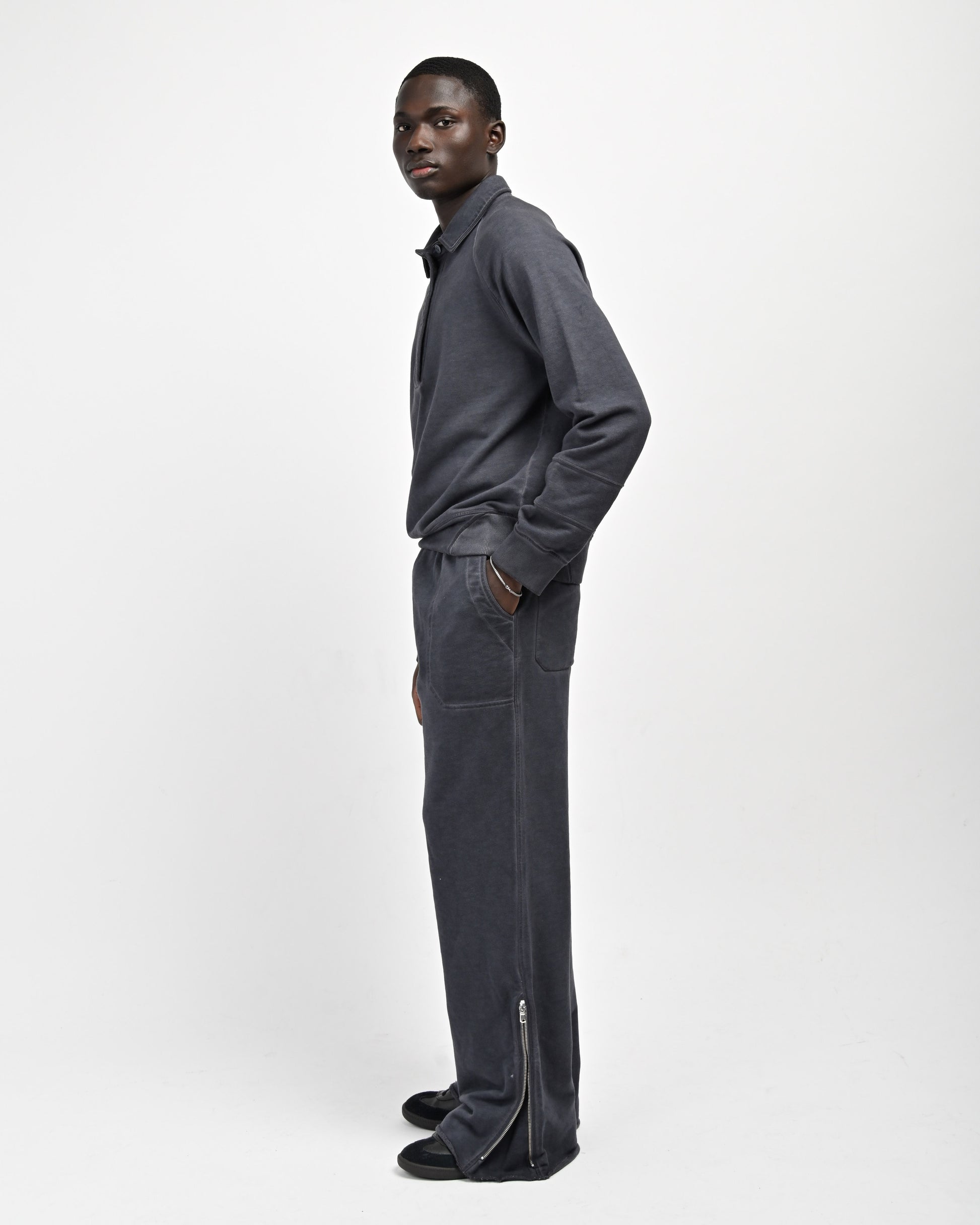 Man in Allora Track Pants by Aseye Studio