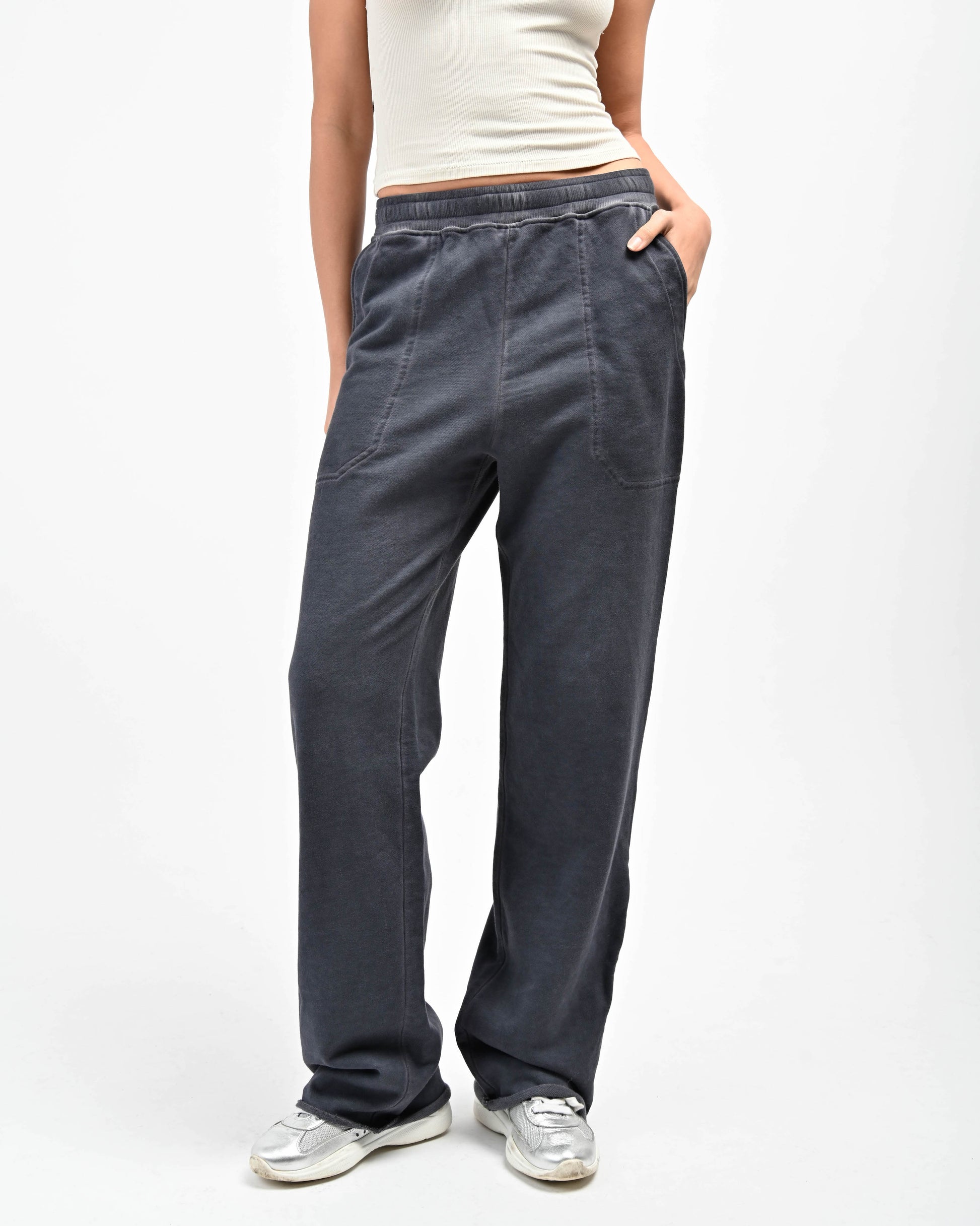Woman in Allora Sweatpants by Aseye Studio