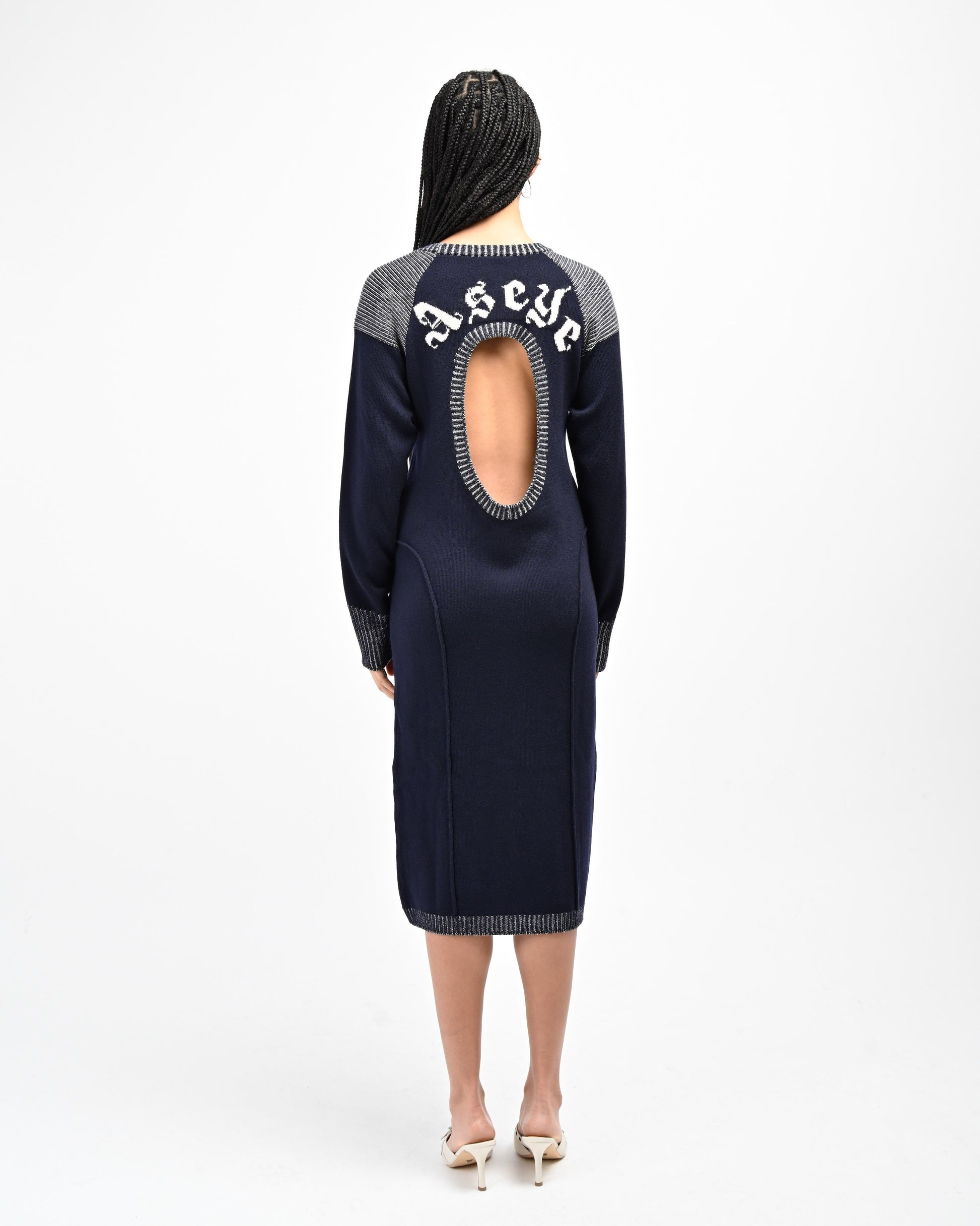 Back View of Model waearing Lola Open Back Dress in Navy Blue by Aseye Studio