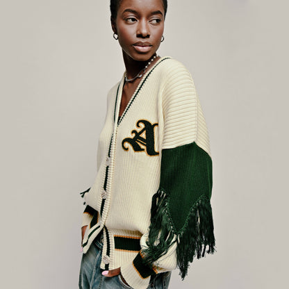 Model in Varsity Cardigan in Cream and Emerald Green