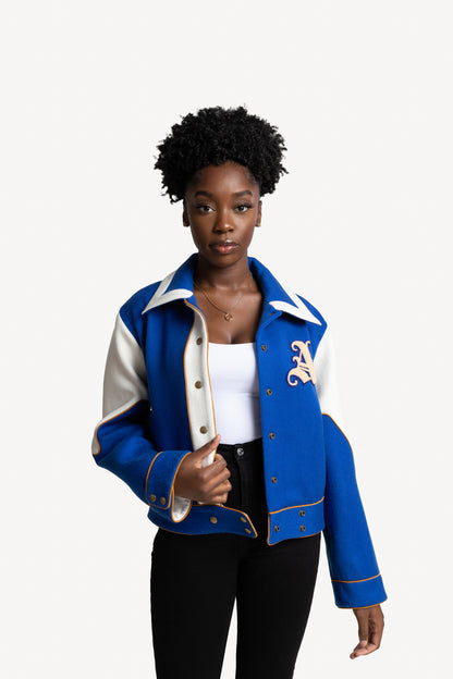 Model wears Liz Varsity Jacket in Royal Blue and size Large.