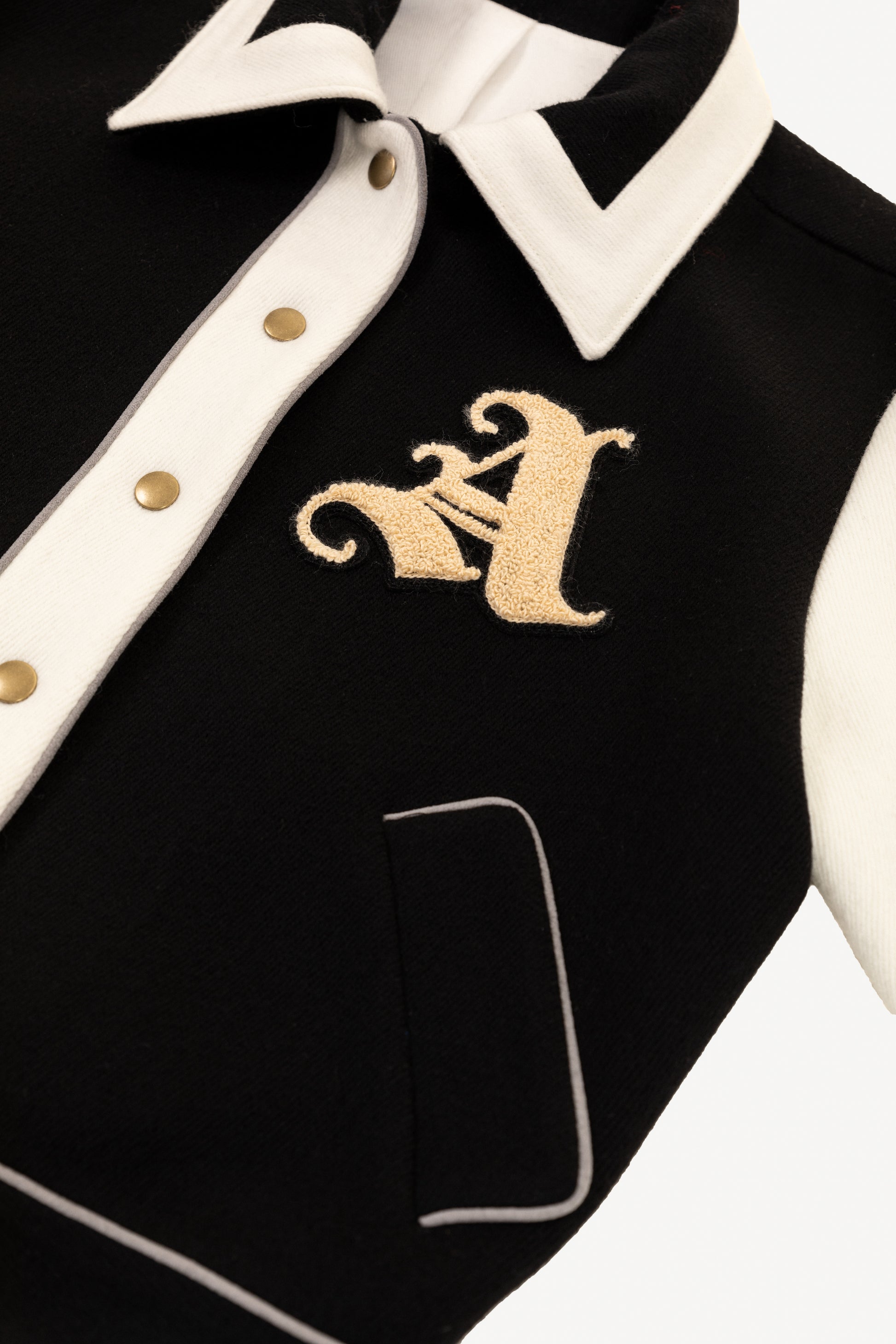 Detail View of Liz Varsity Jacket in Black